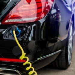 Home 21 Bigstock Ev Car Or Electric Car At Char 316328527